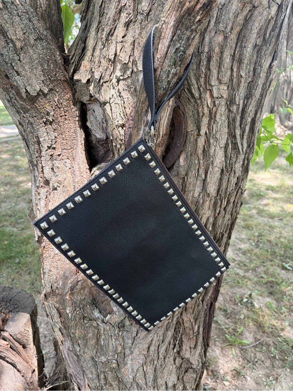 Carlos Santana Black And Silver Studded Women’s purse With Wristlet Strap.